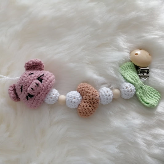 Attache tétine en crochet en forme de cochon rose
