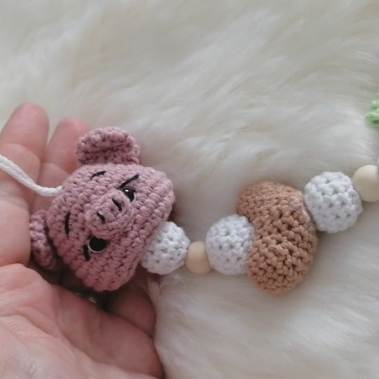 Attache tétine en crochet en forme de cochon rose